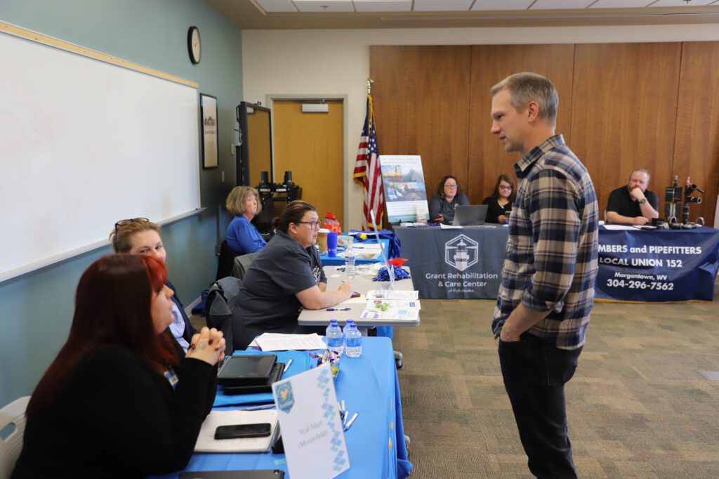 WV State Treasurer talking with employers