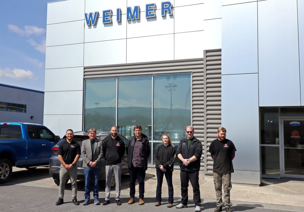 Group of people at Weimer Automotive in Moorefield